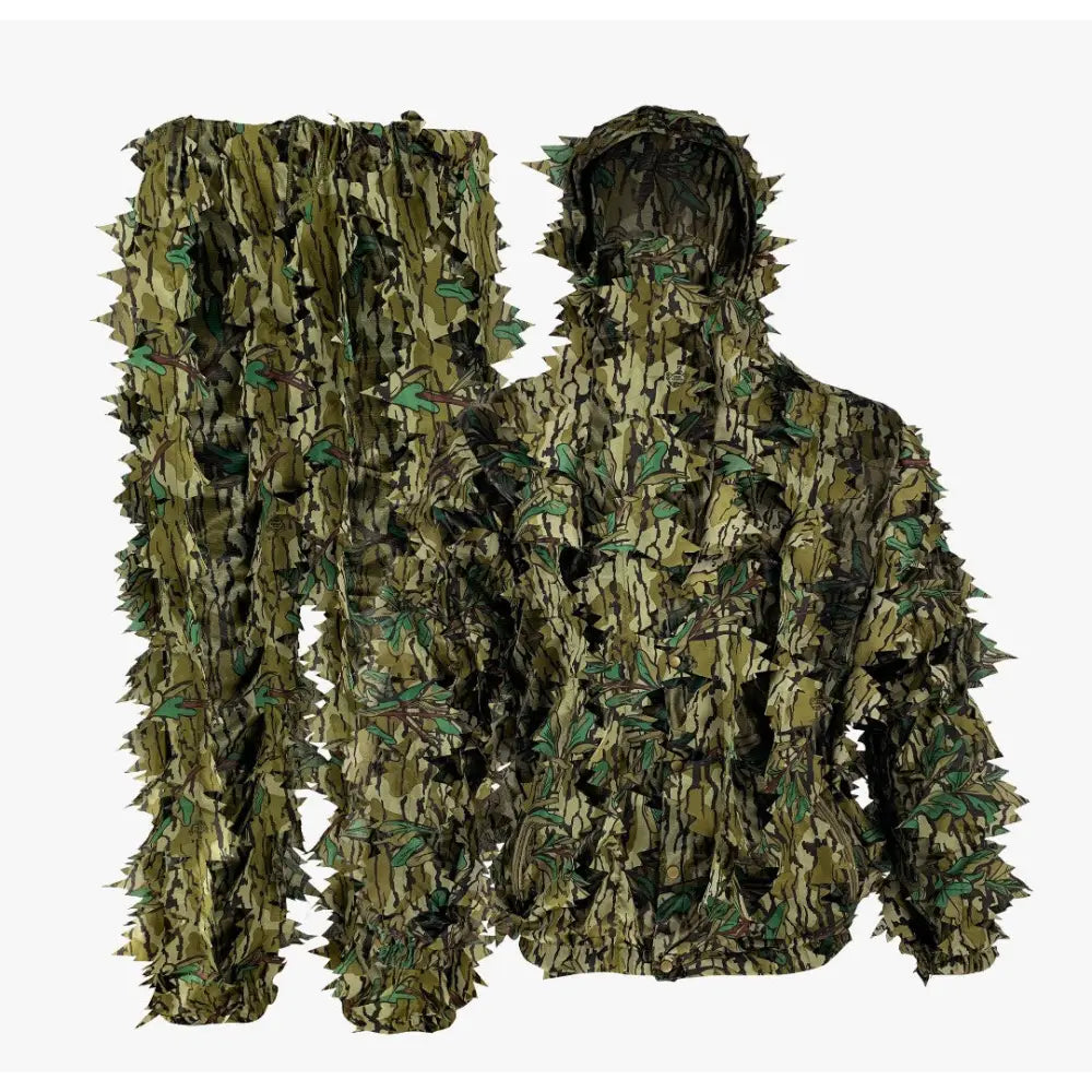 Child wearing a mossy oak green leafy suit by Titan 3D, designed for kids, featuring realistic leafy patterns.