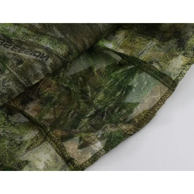 Titan 3D face mask with leafy pattern, made of breathable fabric, designed for comfortable wear and face protection.